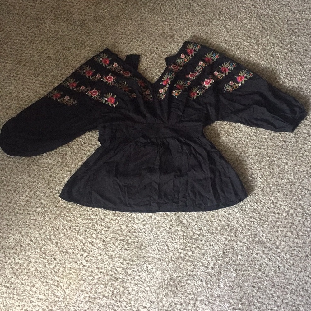 Brand new black open back blouse